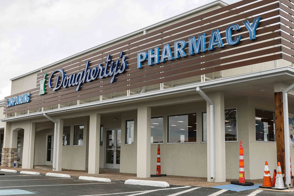 the new dougherty s pharmacy opens monday at the southwest corner of